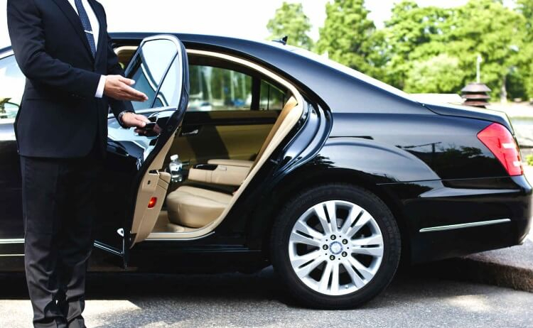 Driver is opening Car's gate