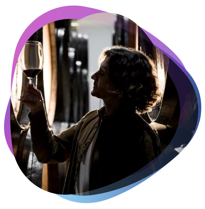 A man is enjoying wine